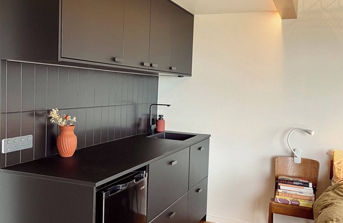 Warea House | Sauna, seafront, and architecture steps away from the Tasman Sea