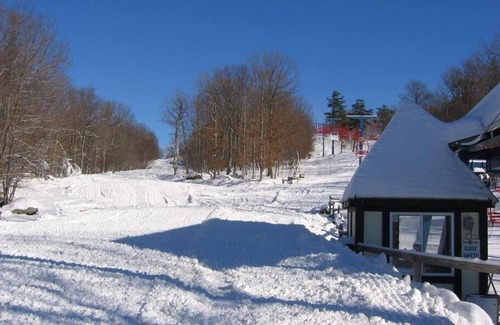 Bushkill Ski Chalet | Saw Creek Chalet with multiple pools by Bushkill Falls