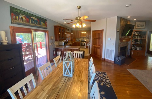 Rock Harbor House | Scenic 6BR lakefront home in cove with private dock, boat slips, hot tub-Dogs ok