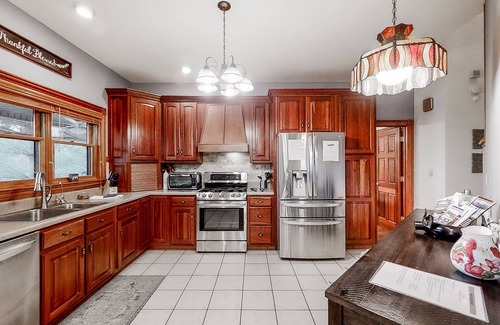 Rock Harbor House | Scenic 6BR lakefront home in cove with private dock, boat slips, hot tub-Dogs ok