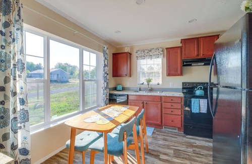 Rapid City Cottage | Scenic Retreat w/Cozy Fire Pit Near Torch Lake