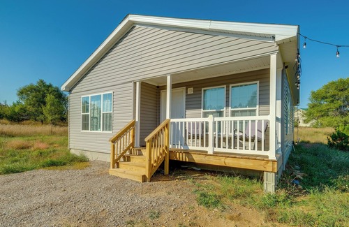 Rapid City Cottage | Scenic Retreat w/Cozy Fire Pit Near Torch Lake