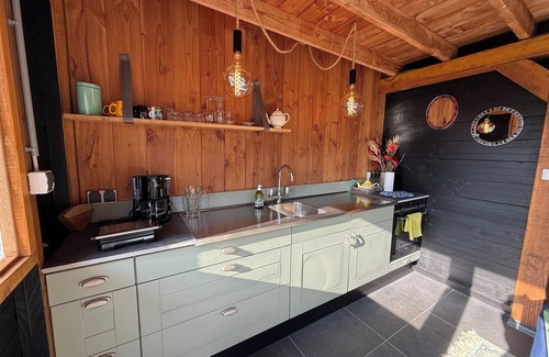 Schoorldam House | SCHOORL: Pretty little holiday house with a beautiful garden and covered veranda.