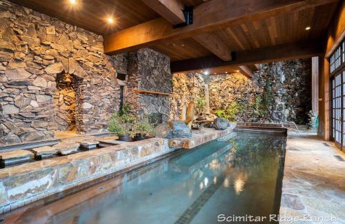 Anacortes House | Scimitar Ridge Ranch - Luxury Lodge - Sleeps 35 with Indoor Pool Villa