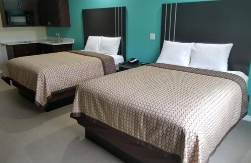 Bay City Hotel | Scottish Inns Bay City, 2 Queen Beds Kitchenette Non-Smoking, 2 Units