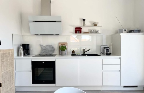 Fedderwardersiel Apartment | Sea and comfort - vacation apartment PIT with balcony and directly on the North Sea dike!