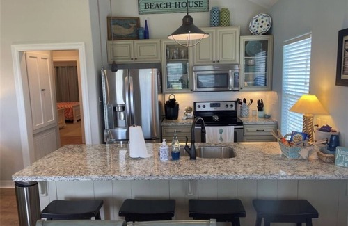 Crystal Beach House | Sea Batical. A short 5 minute walk to the sandy beach!