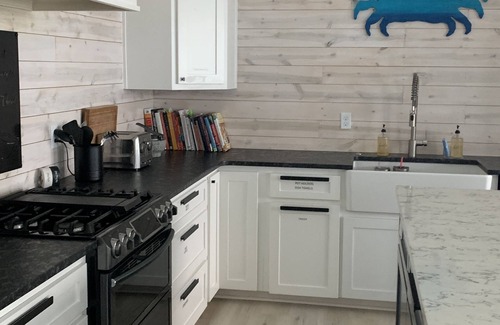 Rockport House | Sea Breeze Cove-waterfront-rooms with views, dock with fish