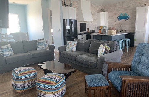 Rockport House | Sea Breeze Cove-waterfront-rooms with views, dock with fish