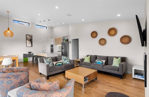 Langs Beach House | Sea Spray - Large modern, sunny holiday home with expansive decks and stunning views over Bream Bay