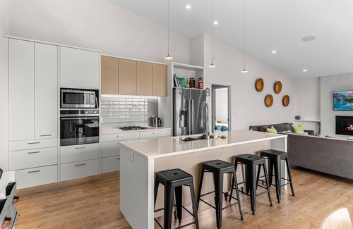 Langs Beach House | Sea Spray - Large modern, sunny holiday home with expansive decks and stunning views over Bream Bay