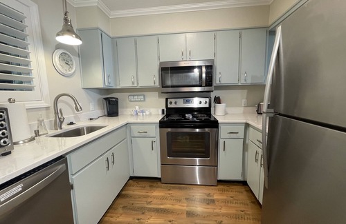 Caswell Beach Condo | Sea Turtle Sanctuary-Ocean Front Condo on Perfect Private Beach!