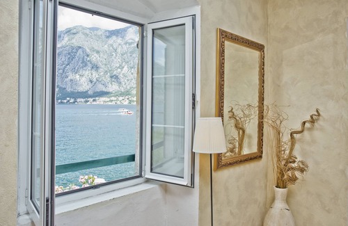 Prcanj Apartment | Seafront, traditional Stone Apartment with Mountain Views.