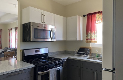 Lucea House | Seamist Holiday home with Spectacular Mountain View, walk to beach pool gym