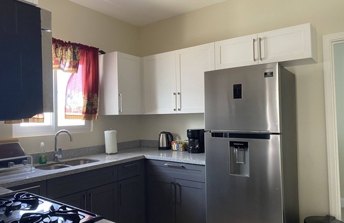 Lucea House | Seamist Holiday home with Spectacular Mountain View, walk to beach pool gym