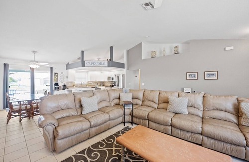 Trafalgar House | Seas the Day! Heated Pool Home on Canal 4 bedroom/2 Bath