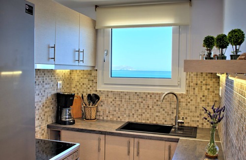 Kokkini Chani Villa | Seashell, an Elegant Seafront Villa by Nirousuites