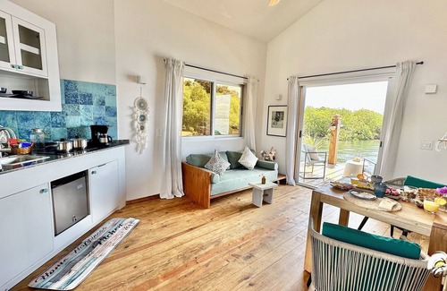 Isla Solarte House | Seaside Dream Over Water Bungalow, Bedroom, King Bed, Living Room, Kitchenette