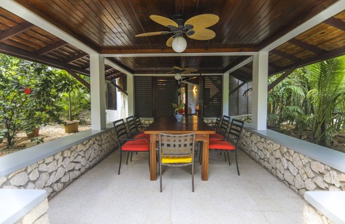West End House | Seaside Garden Villa in Lush Cliffside Setting