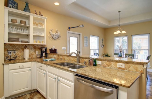Sand Point House | Seaside Paradise – 4BR/3BA – Steps from the beach boardwalk and pool.