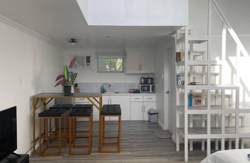 Sipalay Hotel | Seaside Retreat: Beach Loft Living