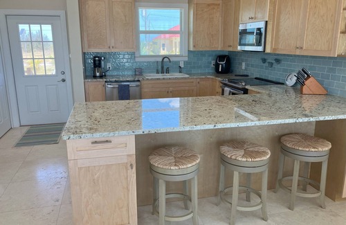 Pelican Point House | Seaside Serenity: Stunning 3 Bedroom Home with 100 ft of Beachfront