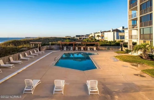 Wrightsville Beach Condo | Seaside Solace: Panoramic Views Ocean front property with pool