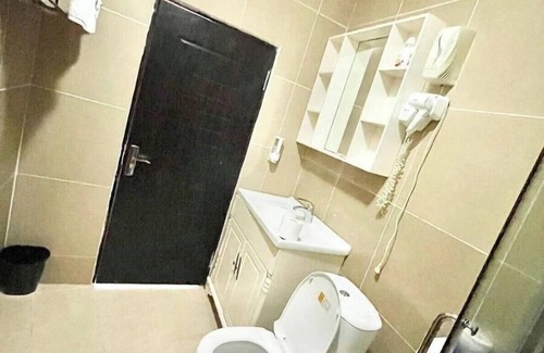 Freetown Hotel | Seaside Suites and Hotel Room #115