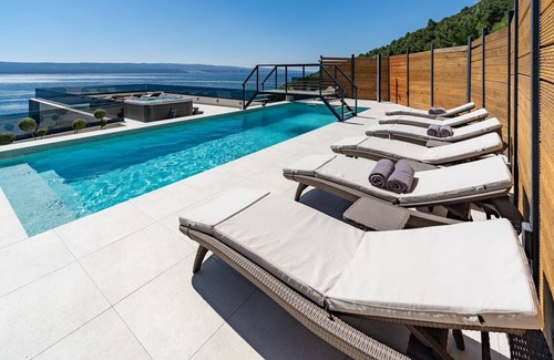 Pisak Villa | Seaview Villa Blue Lagoon with private heated pool, 2 jacuzzies, sauna, media room, 6 bedrooms, beach 70m