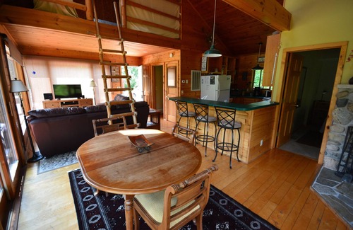 Mayfield House | Secluded Boardman River home with a HOT TUB, Smart TV, Kayaks. Dogs ok