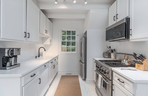 Southold House | Secluded charmer with gunnite & saltwater pool, stone fireplace steps to beach!