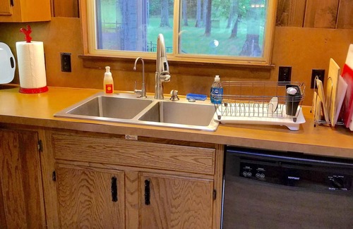Mayfield Cottage | Secluded Cottage on the Boardman River w/Hot Tub & Fireplace