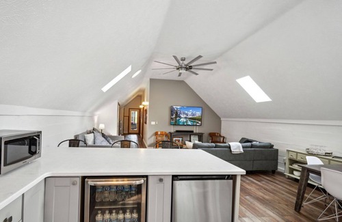Burt Lake Cottage | Secluded hideaway in the woods! Renovated, well appointed 1928 cottage
