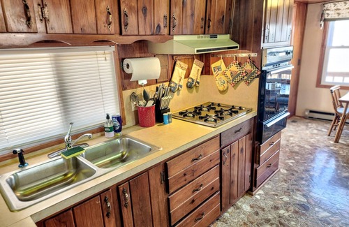 Stover House | Secluded Lake of the Ozarks Vacation Home Waterfront with a Covered Dock.