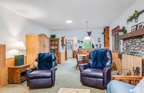 Tomahawk Cabin | Secluded lakefront cabin with private beach, deck, views & firepit- dog-friendly