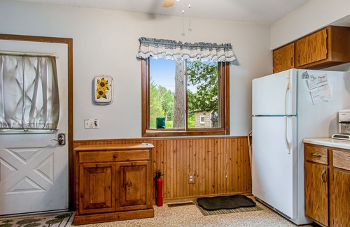 Tomahawk Cabin | Secluded lakefront cabin with private beach, deck, views & firepit- dog-friendly