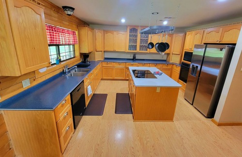 Yantis Cabin | Secluded Lakefront Cabin with Pool and Private Boat Ramp