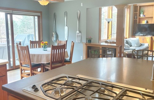 Stillwater House | Secluded Lakefront Home with outdoor hot tub, fire pit & indoor Hockey Rink