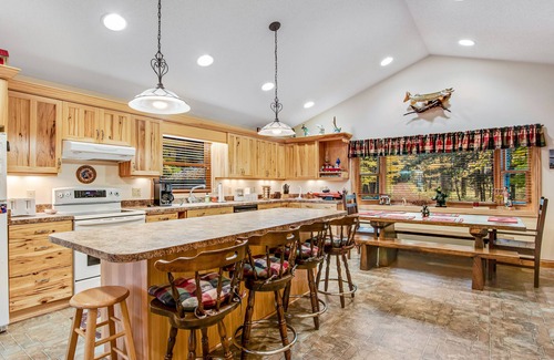 Lac du Flambeau House | Secluded lakefront home with kayaks, canoe, swim platform, firepit, & W/D