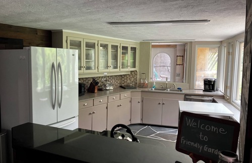Emporium House | Secluded, organic modern 3-bedroom home in wooded setting.