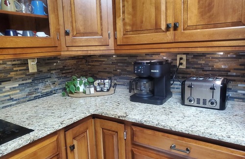 Killbuck House | Secluded peaceful family home! Large deck, patio, waterfalls, koi pond, hot tub!