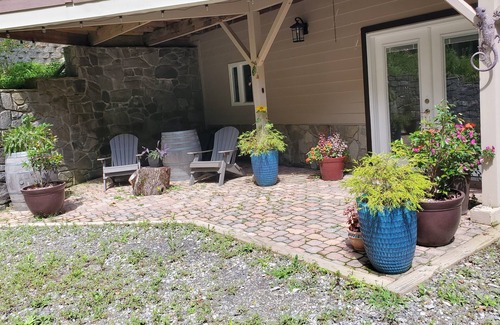 Waynesville Apartment | Secluded, peaceful property with waterfall feature and mountain views.