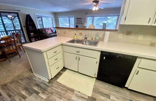 Grayling House | Secluded Riverfront Home in Grayling