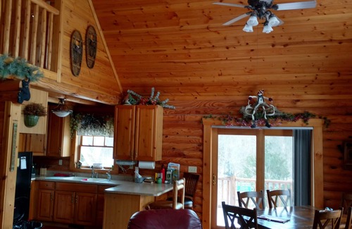 Fulton House | Secluded Riverside Log Home in Southern Michigan