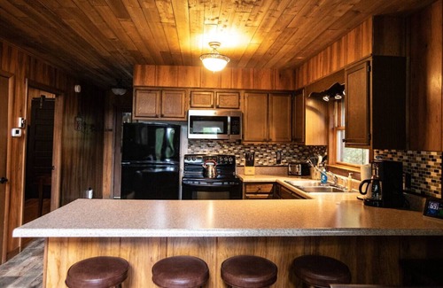Wolf Laurel Cabin | Secluded Rustic Mountain Cabin within Gated Community w/Hot Tub, Firepit & View