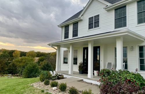 Honey Creek House | Secluded, spacious, hilltop acreage home with stunning views of Omaha skyline