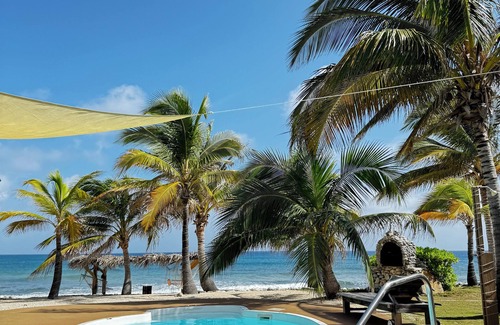 West End House | Secluded Sunsets 3400 Sq Ft Villa with 3 Separate Suites on the Ocean with Pool!