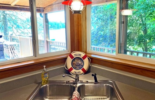 Burr Oak Cabin | Secluded SW Michigan Lake View Log Cabin w/Fire Pit & Deck on Long Lake
