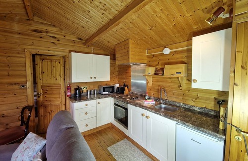 Truro Cottage | Secluded Swedish Lodge in Private Lakeside Gardens