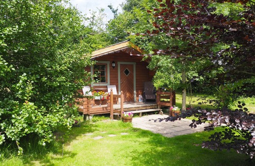 Truro Cottage | Secluded Swedish Lodge in Private Lakeside Gardens